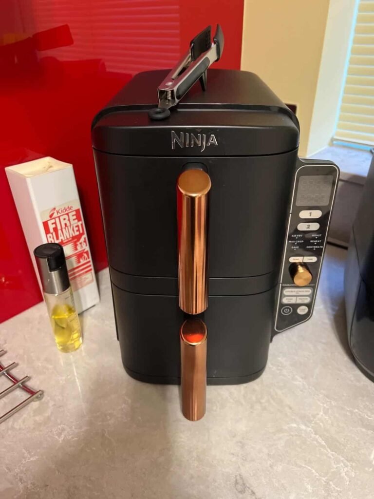 view of our own purchase testing ninja double stack xl sl400uk air fryer for family of 4 uk unboxing package arrival several weeks to months 