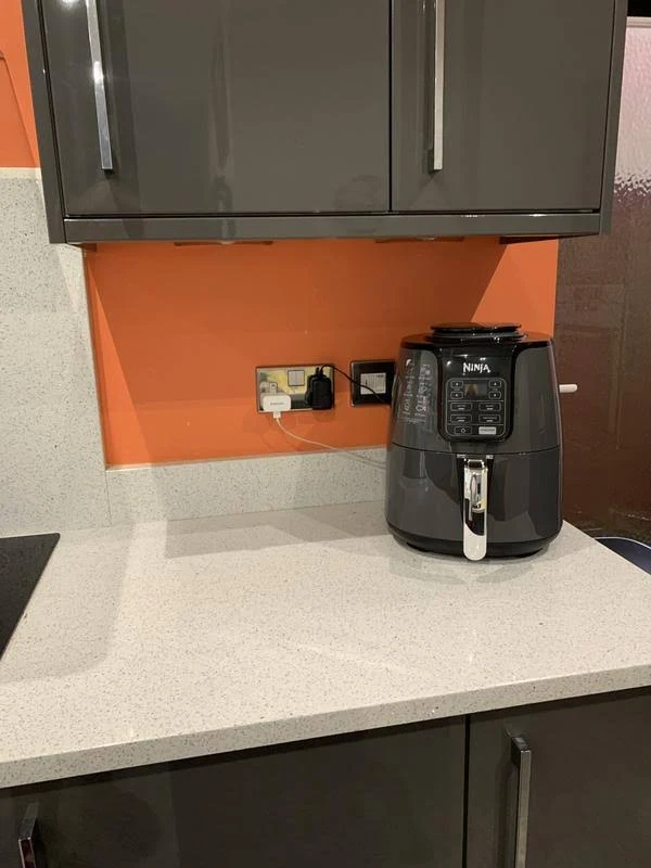 view of our own purchase testing ninja air fryer af100uk (3.8l) budget air fryer uk unboxing package arrival several weeks to months